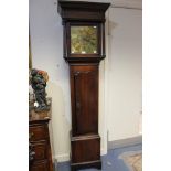 A George III oak longcase clock, having a 30 hour movement, the brass dial,