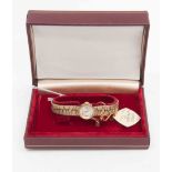 A 1960s ladies 9ct gold Longines watch with integral 9ct gold bark finished bracelet,