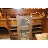 A George III oak dresser rack, with plate shelves,