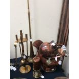 A collection of assorted copper ware,