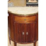 An early 20th Century marble topped mahogany demilune side cabinet,