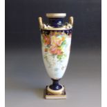 A Mintons Vase .White ground Painted with roses, leaves and blue flower sprigs.