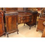 An early 20th Century mahogany twin pedestal sideboard,