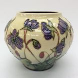 A Moorcroft squat vase in Hepatica pattern, measuring approx 11 cms high (4¼ ins),