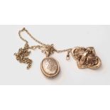 A Victorian brooch and safety chains (9ct) and a locket and chain Victorian