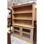 A 19th century pitch pine book case of large proportions