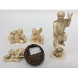 Four Japanese male oriental carved ivory figures, early 20th century,