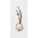 A Cyma nine carat gold watch, ladies, round dial,