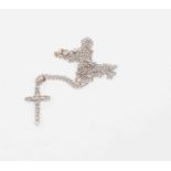 An eighteen carat white gold diamond set cross and chain, a total diamond weight of 0.