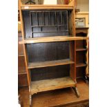 An Arts and Crafts oak fall front desk, circa 1910, the fall front enclosing a fitted interior,