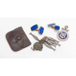 A pair of silver hallmarked engine turned blue and black enamelled chain cufflinks,