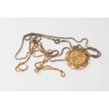 A 9ct gold mounted half sovereign with silver chain 1907,