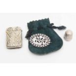 A 19th century 'Lucy' brooch silver, a white metal vesta case and a silver thimble, Birmingham,