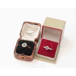 A nine carat gold diamond and ruby ring, approx size O,