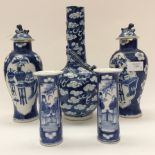 A pair of Chinese blue and white baluster vases and covers,