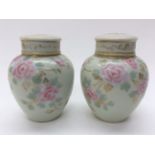 A pair of Noritaki pot pouri vases and covers,