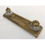 A Victorian cast brass inkwell