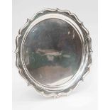 An Edwardian silver tray with pie crust border by John Round, Sheffield,