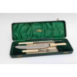 An early 20th century carving set boxed, Canton Workshops, Sheffield,