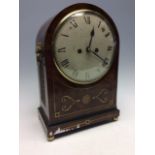 A Regency mahogany bracket clock, circa 1820, the case inlaid with brass, white enamel Roman dial,