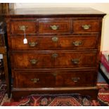 A George I walnut chest of drawers,