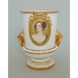 A Royal Worcester urn, white ground with gilt rims and borders and gild birds head ring handles,