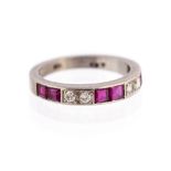 A diamond and ruby half eternity 18ct white gold ring,