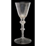 A wine glass, conical bowl, double knop air twist stem, conical foot,