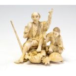 A Japanese ivory okimono group of a farmer and infant, Meiji period, 1868-1912, signed,