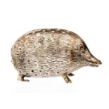 An Edwardian silver novelty pin cushion realistically cast in the form of Hedgehog by Levi &