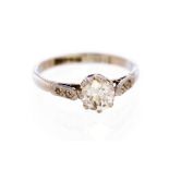 A diamond solitaire 18ct white gold ring, with diamond set shoulders,