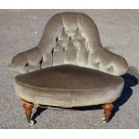 A Victorian deep buttoned back parlour chair,