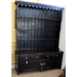 A George III pine dresser and rack, the rack with fixed plate shelves,