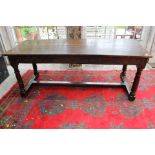 A good 17th century ash and later oak rectangular kitchen trestle table,