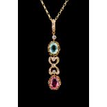 An Edwardian tourmaline and diamond set 15ct gold drop pendant,