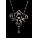 A late Victorian garland style diamond set drop pendant, round old-cut and rose-cut diamonds,