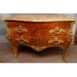 A 19th Century French kingwood commode, of bombe form, marble topped, comprising two fitted drawers,