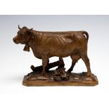 A late 19th Century Black Forest model of a dairy cow, circa 1870, attributed to Johann Huggler,