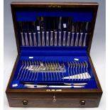 An Elizabeth II silver Old English and Beaded pattern eight piece flatware service,