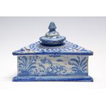 ***AWAY JANE W TO RETURN TO CLIENT***A 19th Century tin glazed blue and white painted triangular