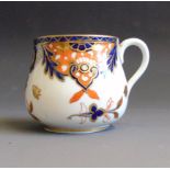 A Davenport barrel shaped cup, decorated in the imari style, Pattern No.