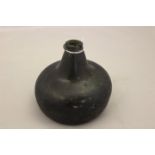 An 18th Century squat onion wine bottle, kick-in base,