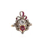 A late Victorian/Edwardian diamond and ruby garland style ring, floral,