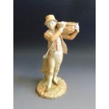 A Royal Worcester figure of a boy carrying a basket on his shoulder standing by a tree trunk spill,