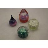 Four Caithness paperweights including Cauldron, Caress, Moondrop and Morning Dew.
