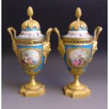 A pair of Sevres vases and covers,