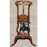 A George III mahogany basin stand, of triangular form, circa 1760,