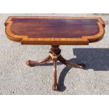 An early Victorian rosewood and satinwood cross-banded fold-over tea table,