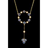 An Edwardian sapphire and seed pearl 15ct gold hoop drop pendant and chain,