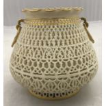 George Owen for Royal Worcester, a blush ivory reticulated vase in the Aesthetic manner,